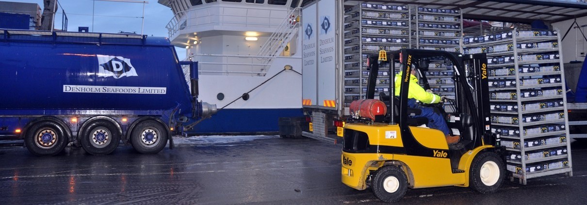 Image of forklift and lorry on site at Denholm Seafoods.